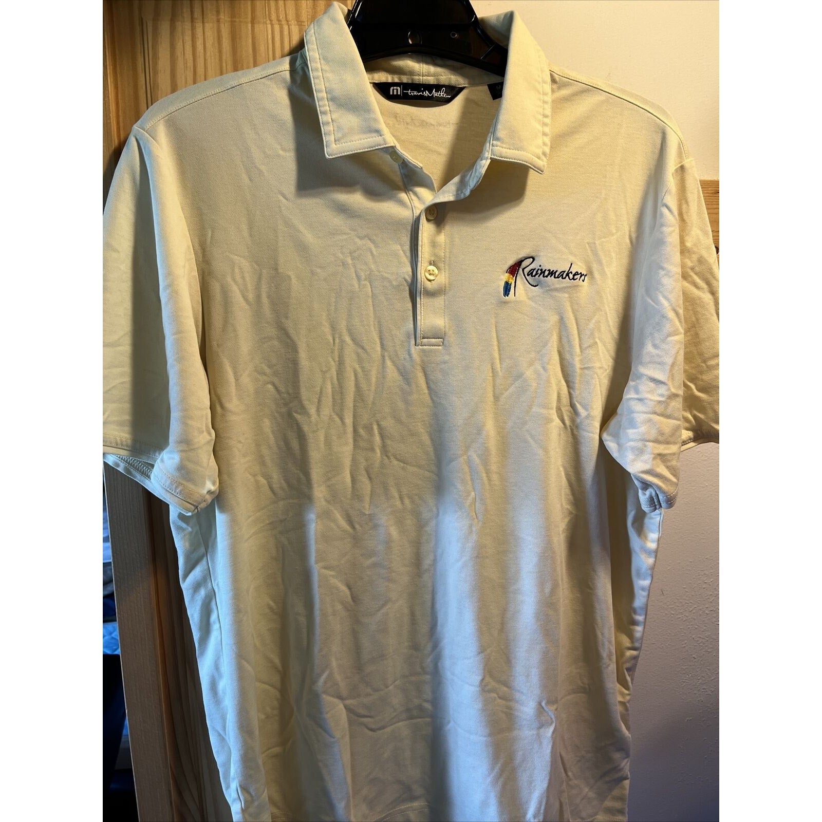 Travis Mathew Shirt Mens M Short Sleeve Button Polo Solid Yellow Rainmaker Logo